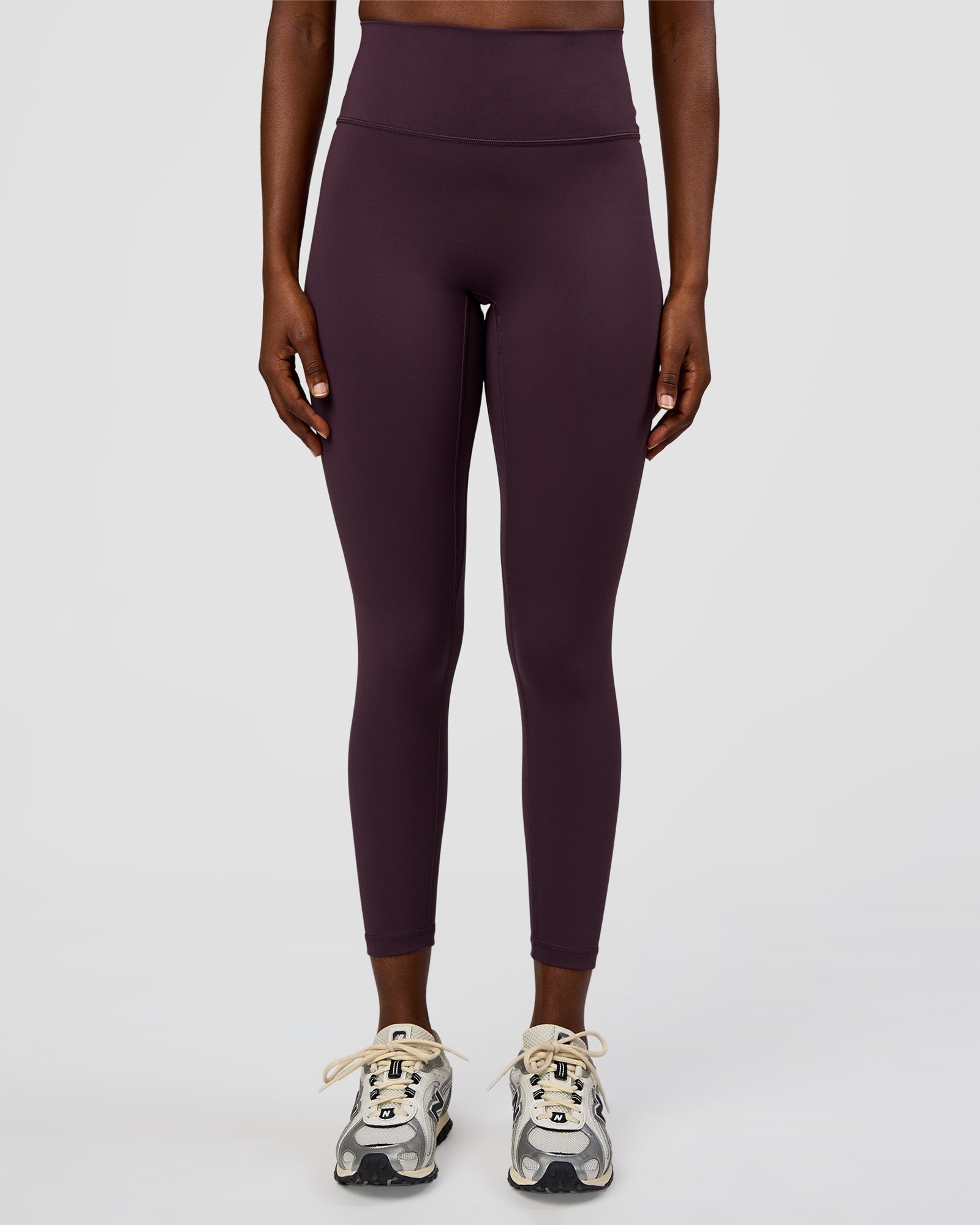 Woman wearing Fusion Ultra High-Rise 7/8 Legging - Midnight Plum | Model:Ellie | Size:S