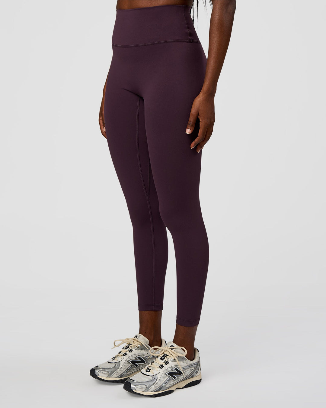 Woman wearing Fusion Ultra High-Rise 7/8 Legging - Midnight Plum | Model:Ellie | Size:S