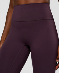 Woman wearing Fusion Ultra High-Rise 7/8 Legging - Midnight Plum | Model:Ellie | Size:S