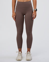 Woman wearing Fusion Ultra High-Rise 7/8 Legging Pockets - Peppercorn | Model:Emelia | Size:S