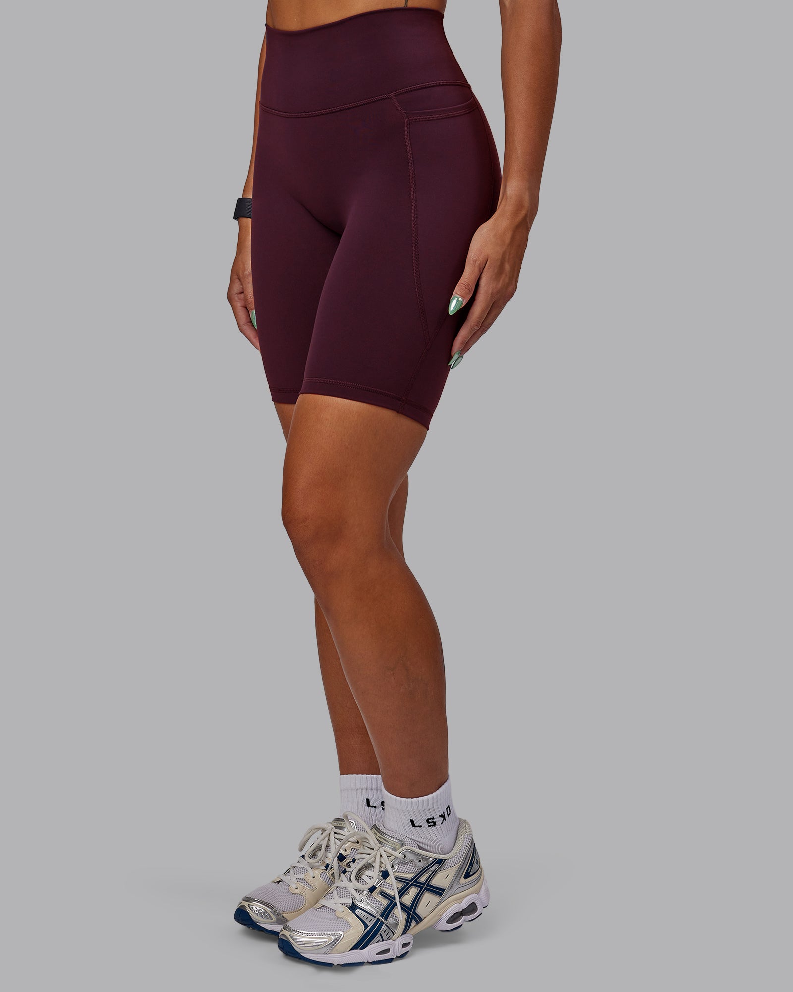 Woman wearing Fusion Ultra High-Rise 9" Short Pockets - Cherry Lacquer | Model:Vanessa | Size:S