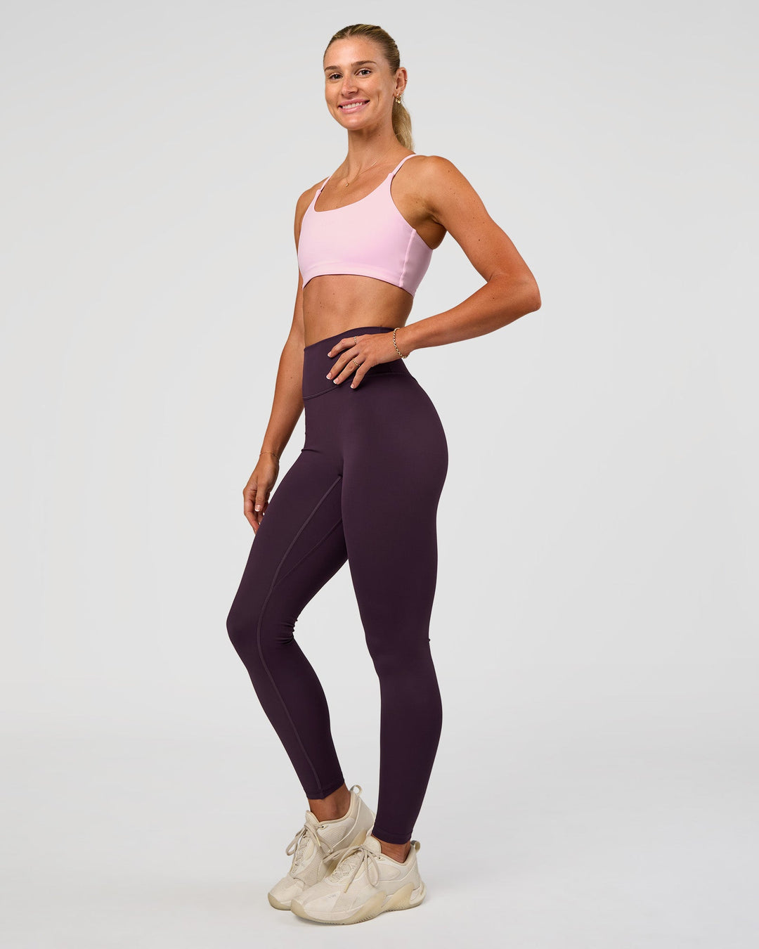 Woman wearing Fusion Ultra High-Rise Full Length Legging - Midnight Plum | Model:Emelia | Size:S