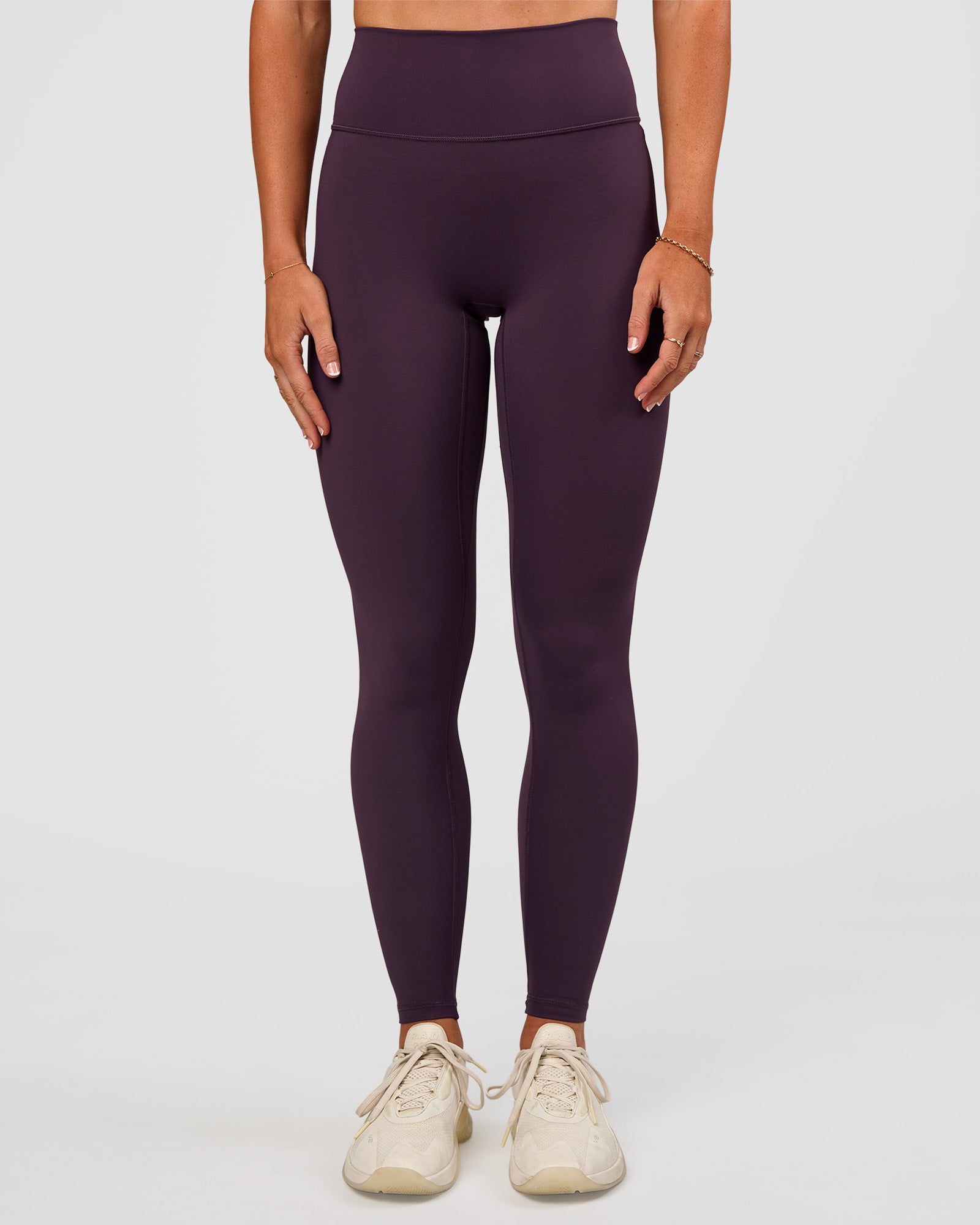 Woman wearing Fusion Ultra High-Rise Full Length Legging - Midnight Plum | Model:Emelia | Size:S