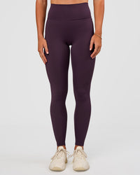 Woman wearing Fusion Ultra High-Rise Full Length Legging - Midnight Plum | Model:Emelia | Size:S