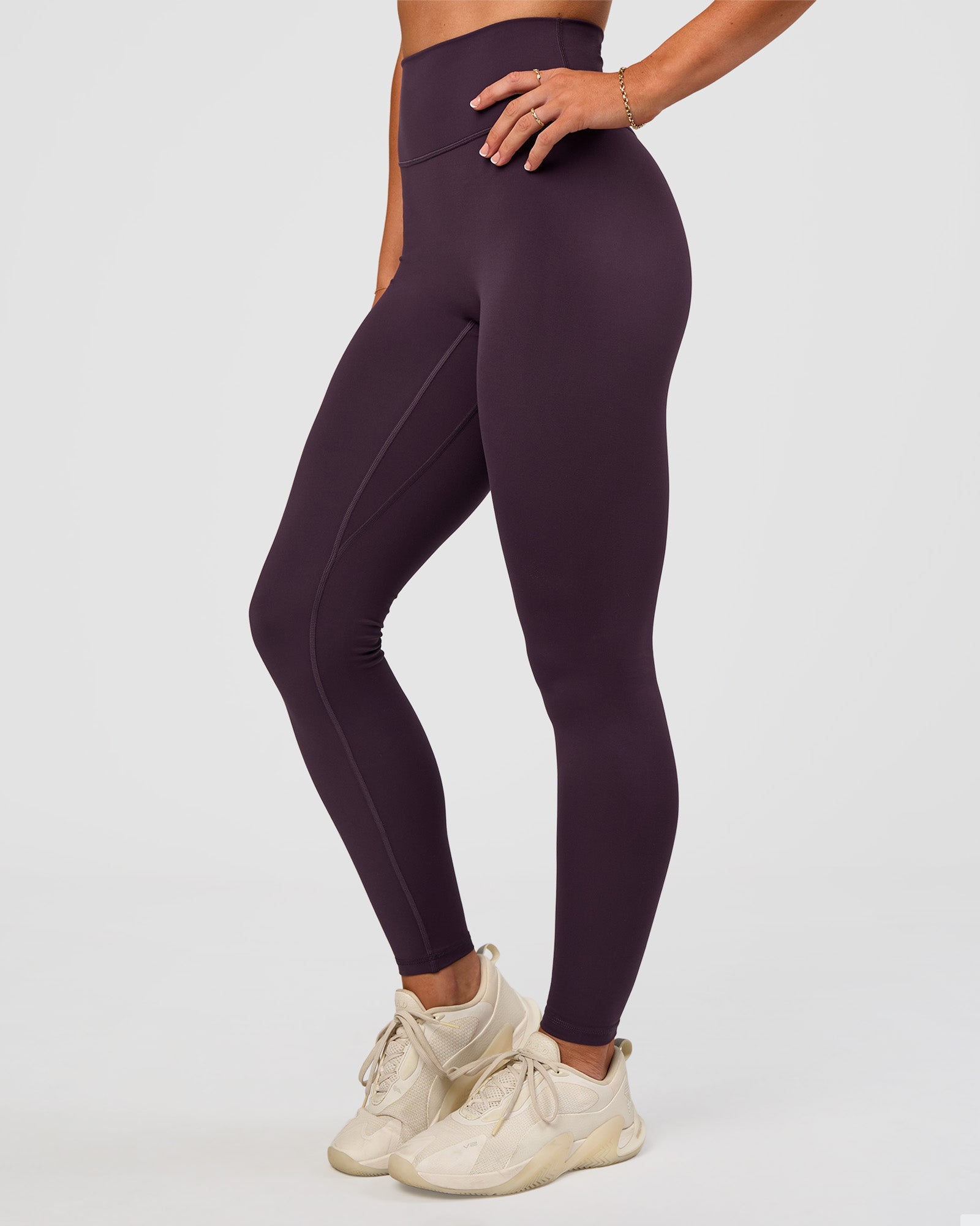 Woman wearing Fusion Ultra High-Rise Full Length Legging - Midnight Plum | Model:Emelia | Size:S