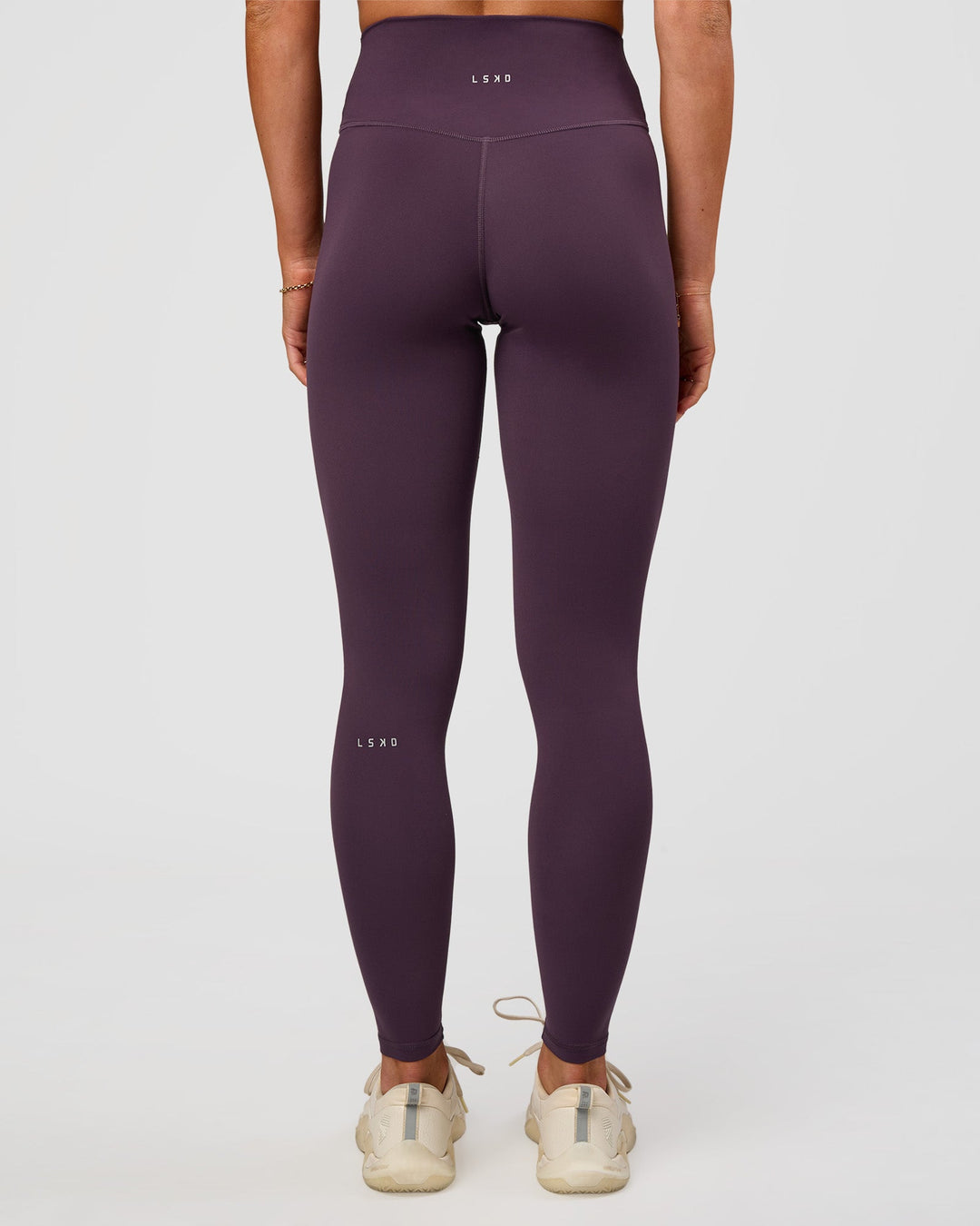 Woman wearing Fusion Ultra High-Rise Full Length Legging - Midnight Plum | Model:Emelia | Size:S