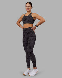 Woman wearing Fusion Ultra High-Rise Full Length Legging Pockets - Black Tie Dye | Model:Keisha | Size:S