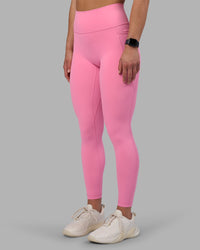 Woman wearing Fusion Ultra High-Rise Full Length Legging Pockets - Candy Pink | Model:Keisha | Size:S