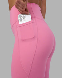 Woman wearing Fusion Ultra High-Rise Full Length Legging Pockets - Candy Pink | Model:Keisha | Size:S