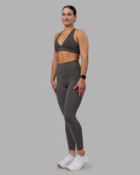 Woman wearing Fusion Ultra High-Rise Full Length Legging Pockets - Dark Storm | Model:Keisha | Size:S