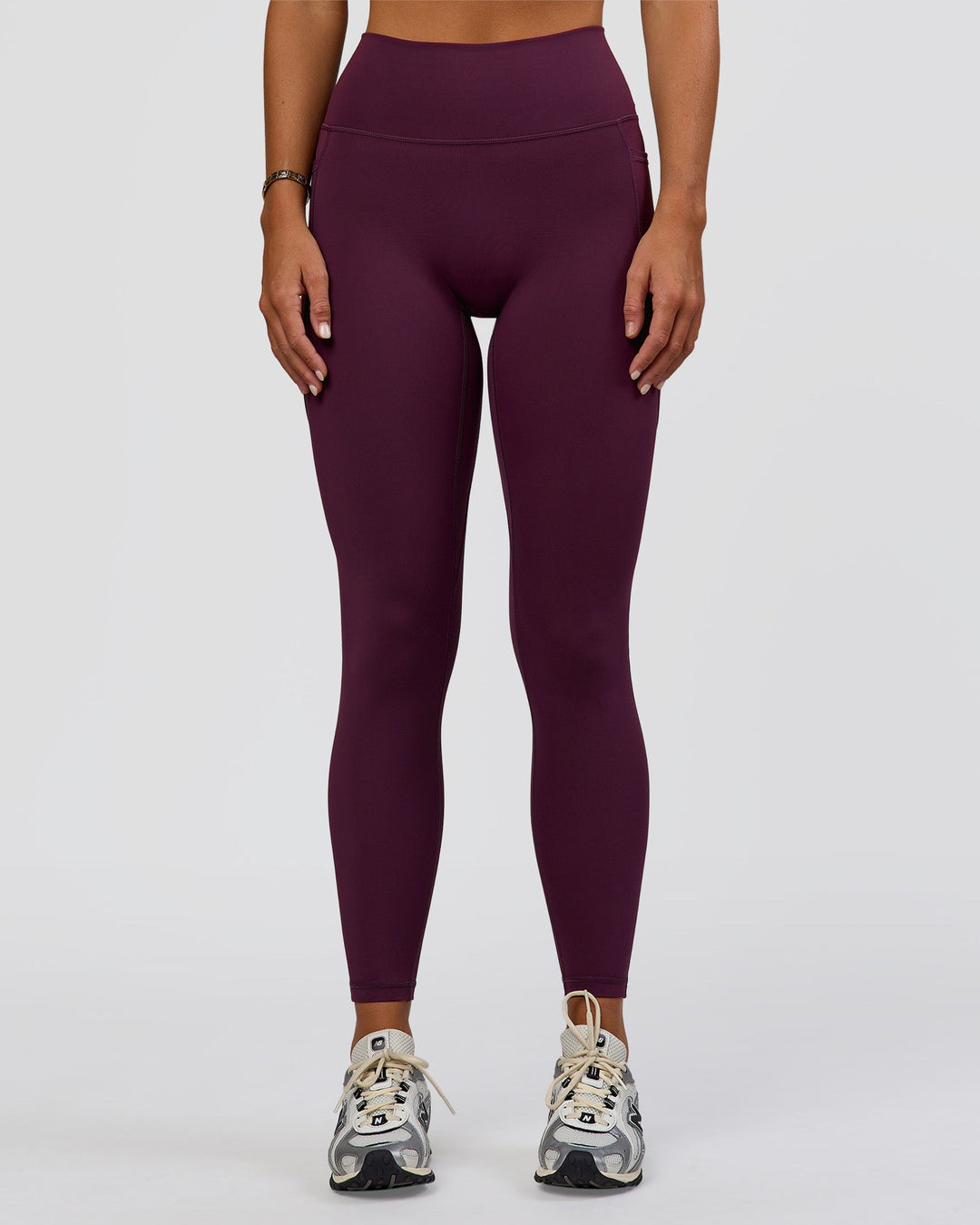 Woman wearing Fusion Ultra High-Rise Full Length Legging Pockets - Midnight Plum | Model:Amity | Size:S