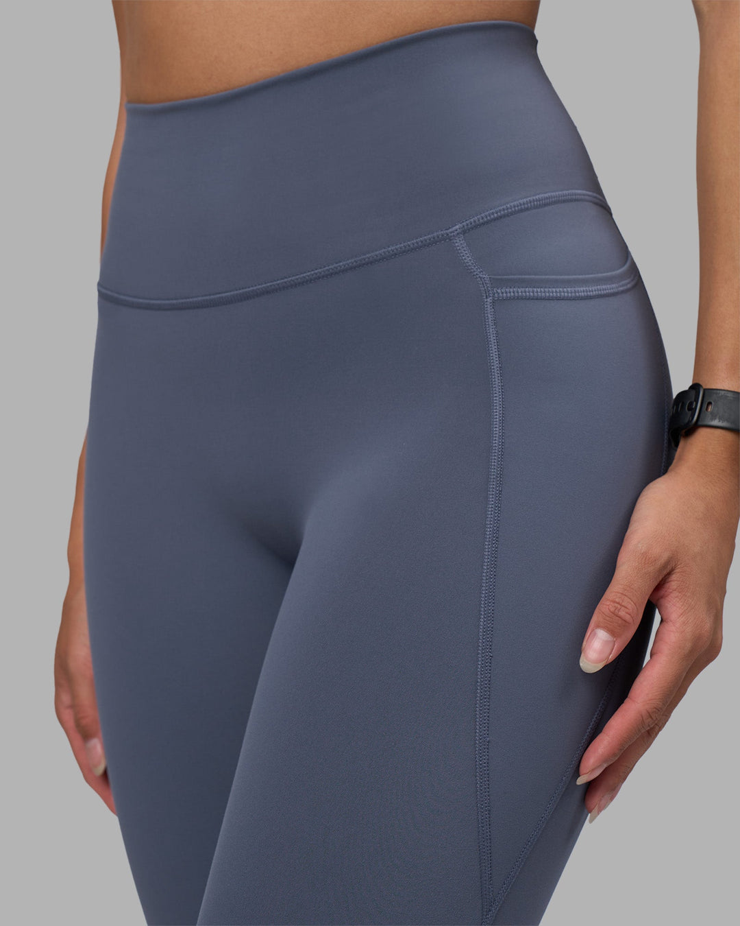 Woman wearing Fusion Ultra High-Rise Full Length Legging Pockets - Night Shadow | Model:Rhiley | Size:S