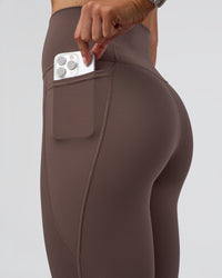 Woman wearing Fusion Ultra High-Rise Full Length Legging Pockets - Peppercorn | Model:Emelia | Size:S