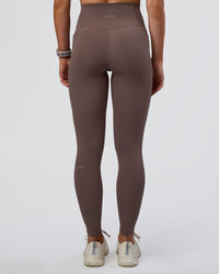 Woman wearing Fusion Ultra High-Rise Full Length Legging Pockets - Peppercorn | Model:Emelia | Size:S