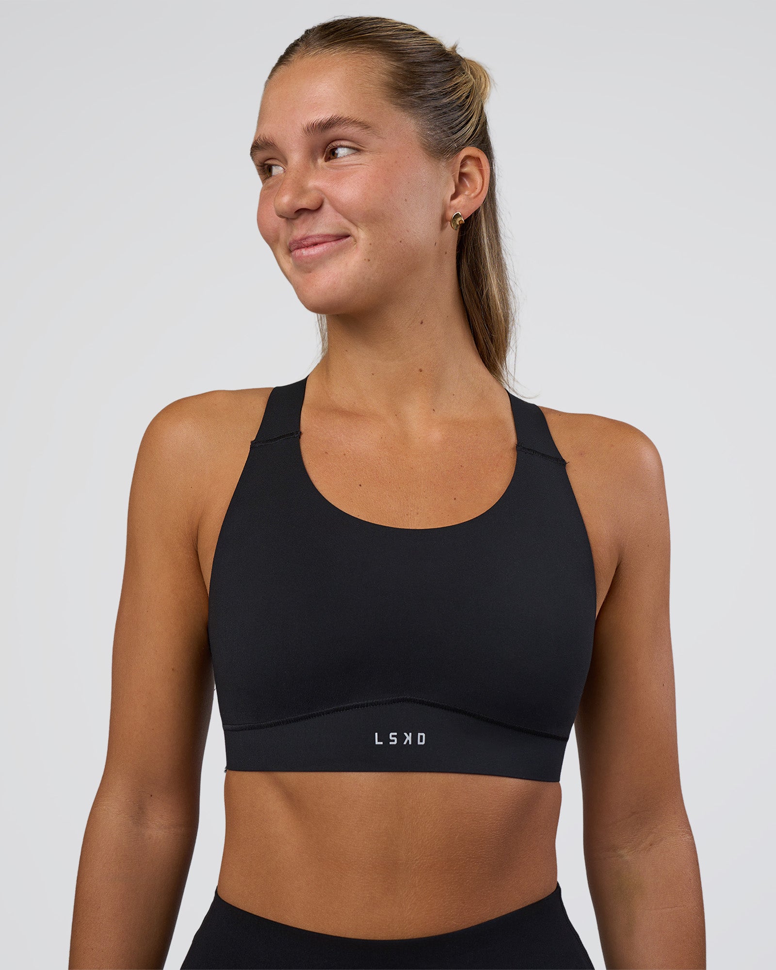 Woman wearing Fusion Sports Bra 2.0 - Black | Model:Amity | Size:S