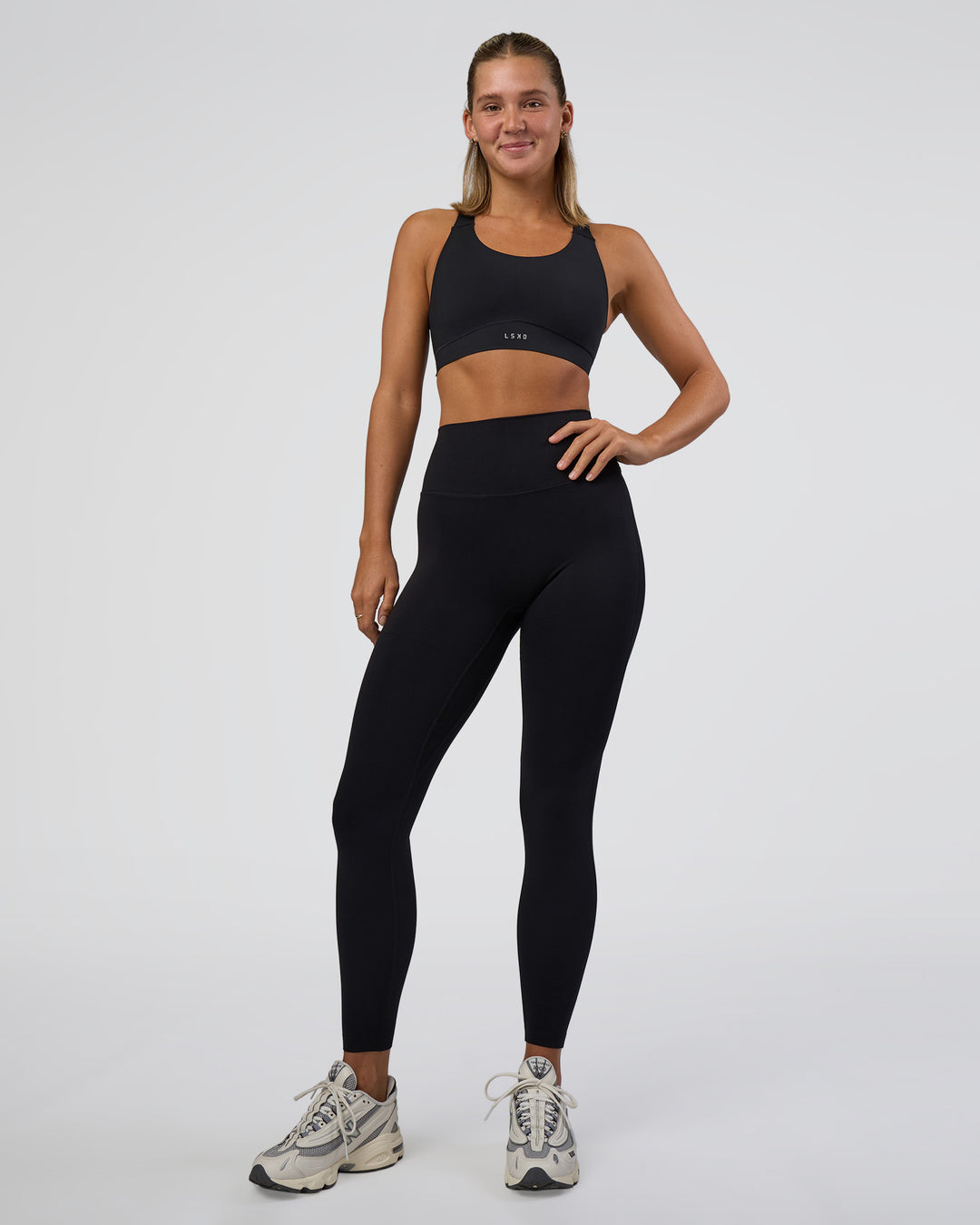 Woman wearing Fusion Sports Bra 2.0 - Black | Model:Amity | Size:S