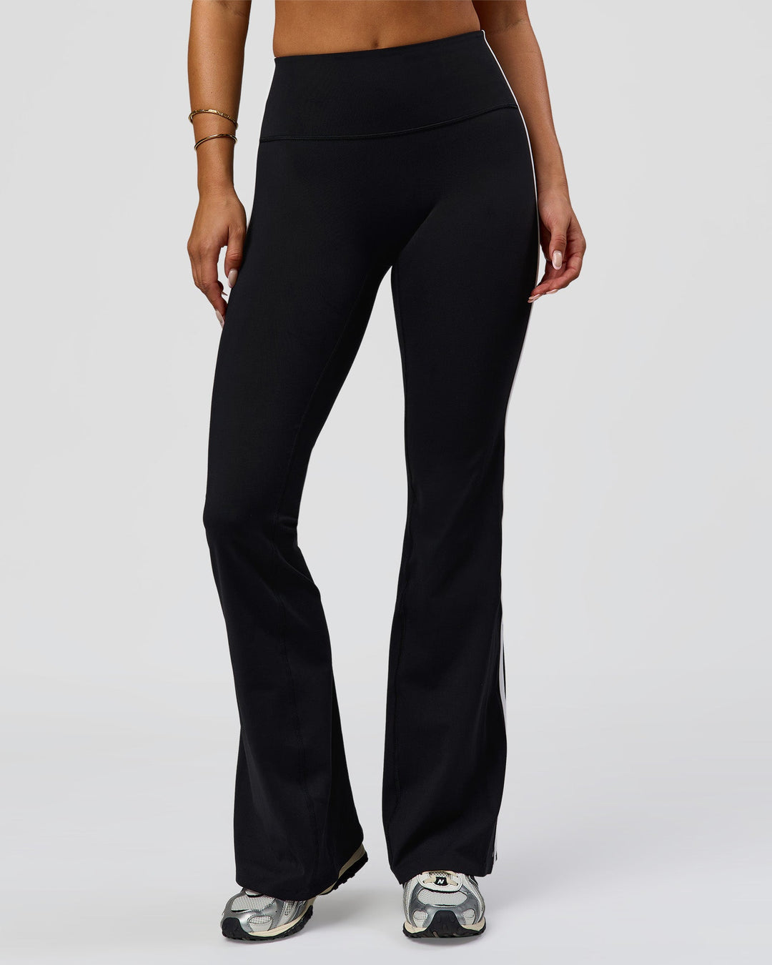 Woman wearing Fusion V-Contour Bind High-Rise Flared Legging - Black-white | Model:Bianca | Size:S - view 9