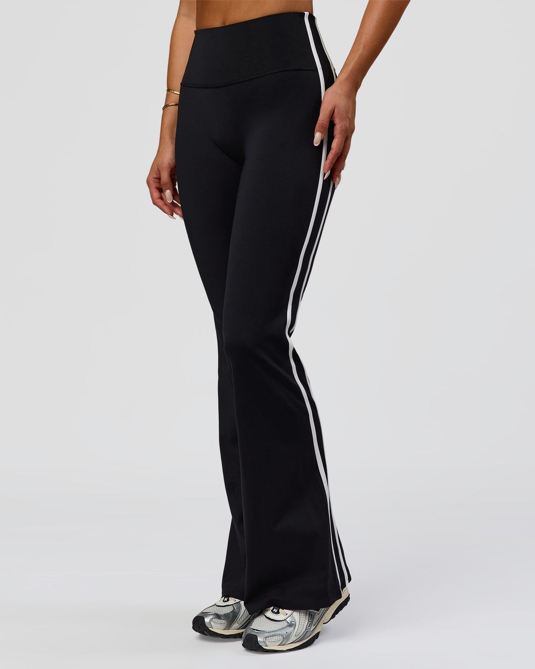 Woman wearing Fusion V-Contour Bind High-Rise Flared Legging - Black-white | Model:Bianca | Size:S - view 5