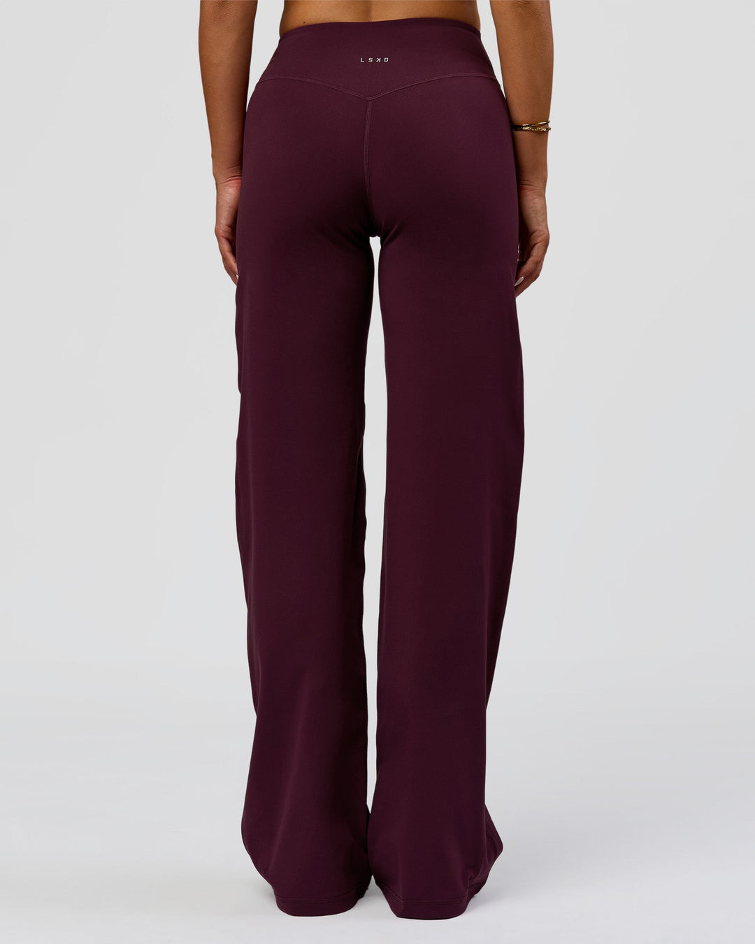 Woman wearing Fusion V-Contour High-Rise Pant - Cherry Lacquer | Model:Bianca | Size:S