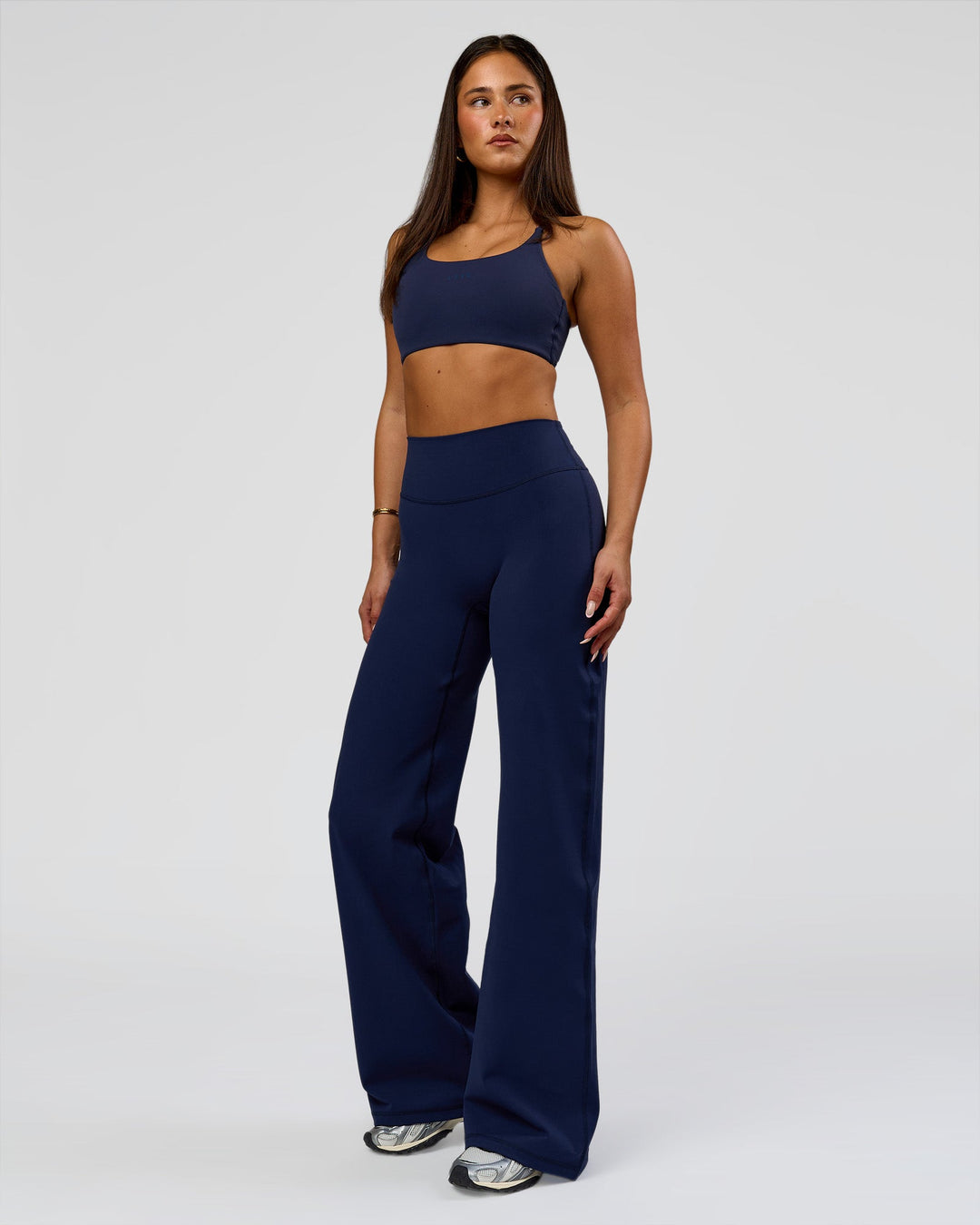Woman wearing Fusion V-Contour High-Rise Pant - Future Navy | Model:Bianca | Size:S