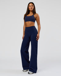 Woman wearing Fusion V-Contour High-Rise Pant - Future Navy | Model:Bianca | Size:S