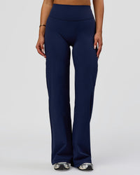 Woman wearing Fusion V-Contour High-Rise Pant - Future Navy | Model:Bianca | Size:S