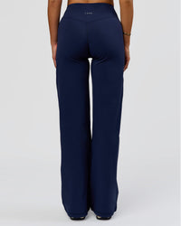 Woman wearing Fusion V-Contour High-Rise Pant - Future Navy | Model:Bianca | Size:S