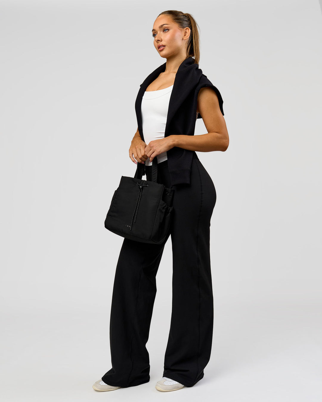 Woman wearing Fusion V-Contour High-Rise Tall Pant - Black | Model:Claire | Size:S