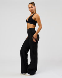 Woman wearing Fusion V-Contour High-Rise Tall Pant - Black | Model:Claire | Size:S