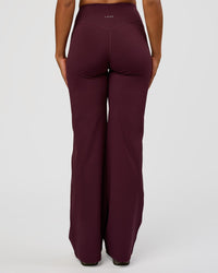 Woman wearing Fusion V-Contour High-Rise Tall Pant - Cherry Lacquer | Model:Rosie | Size:S