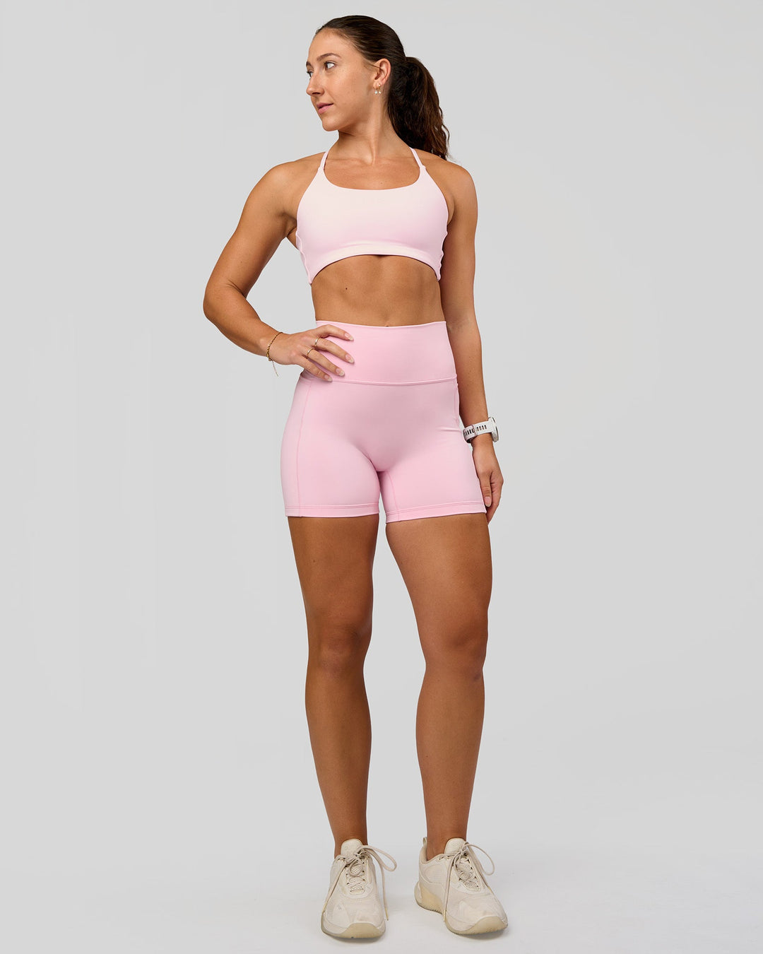 Woman wearing Fusion V-Contour Ultra High-Rise 4” Short Pockets - Marshmallow | Model:Summer | Size:S