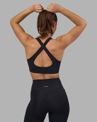 Woman wearing Fusion V-Contour Ultra High-Rise Full Length Legging Pockets - Black | Model:Charlize | Size:S