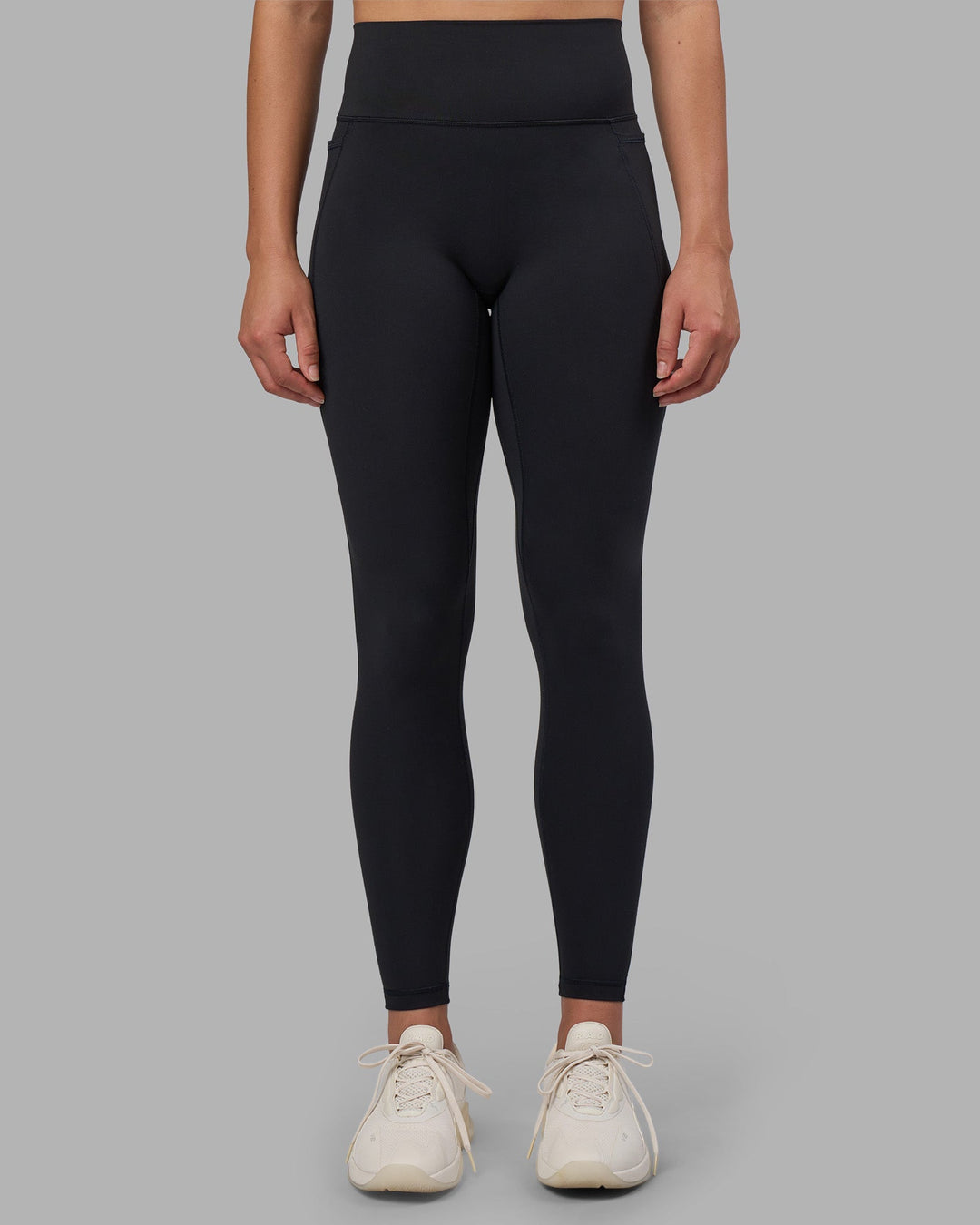 Woman wearing Fusion V-Contour Ultra High-Rise Full Length Legging Pockets - Black | Model:Charlize | Size:S