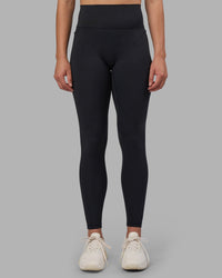 Woman wearing Fusion V-Contour Ultra High-Rise Full Length Legging Pockets - Black | Model:Charlize | Size:S
