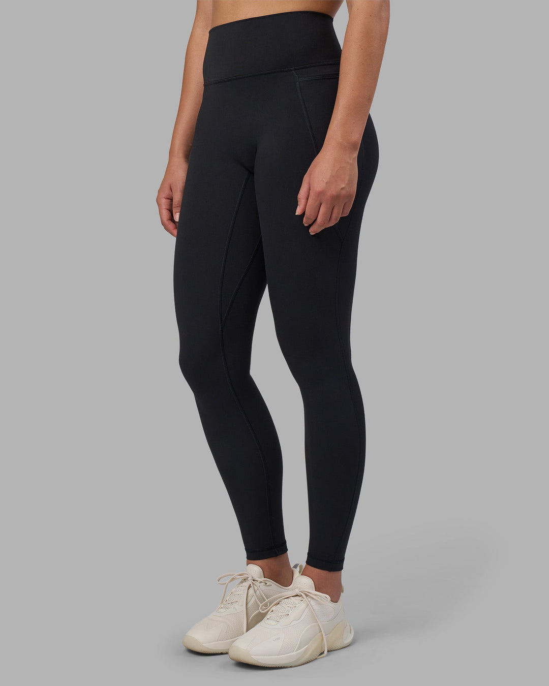 Woman wearing Fusion V-Contour Ultra High-Rise Full Length Legging Pockets - Black | Model:Charlize | Size:S