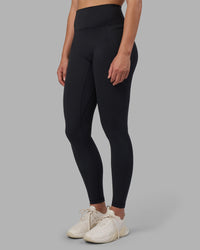 Woman wearing Fusion V-Contour Ultra High-Rise Full Length Legging Pockets - Black | Model:Charlize | Size:S