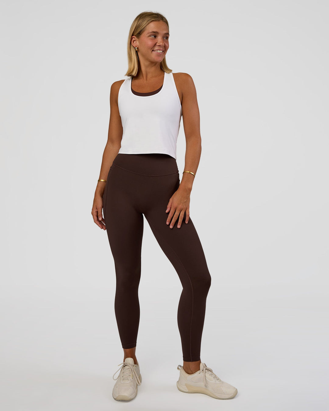Woman wearing Fusion V-Contour Ultra High-Rise Full Length Legging Pockets - Hot Chocolate | Model:Amity | Size:S