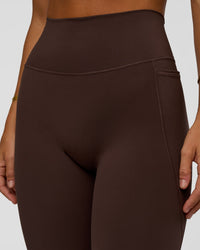 Woman wearing Fusion V-Contour Ultra High-Rise Full Length Legging Pockets - Hot Chocolate | Model:Amity | Size:S