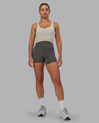 Woman wearing Fusion Ultra High-Rise 4" Short - Dark Storm | Model:Hannah | Size:S