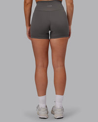 Woman wearing Fusion Ultra High-Rise 4" Short - Dark Storm | Set:true | Angle:back | Model:Hannah | Size:S