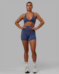 Woman wearing Fusion Ultra High-Rise 4" Short Pockets - Future Dusk | Model:Gabby | Size:S