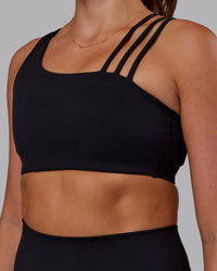 Woman wearing Galvanise Sports Bra 2.0 - Black | Model:Phoebe | Size:S