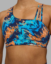 Woman wearing Galvanise Sports Bra 2.0 - React Print | Model:Georgia | Size:S