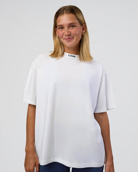 Woman wearing Go-To FLXCotton Oversized Deviation Tee - White-Future Navy | Model:Amity | Size:S