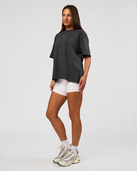Woman wearing Go-To FLXCotton Oversized Tee - Dark Storm-White | Model:Bianca | Size:S