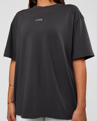 Woman wearing Go-To FLXCotton Oversized Tee - Dark Storm-White | Model:Bianca | Size:S