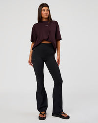 Woman wearing Go-To FLXCotton Oversized Tee - Midnight Plum-White | Model:Bianca | Size:S