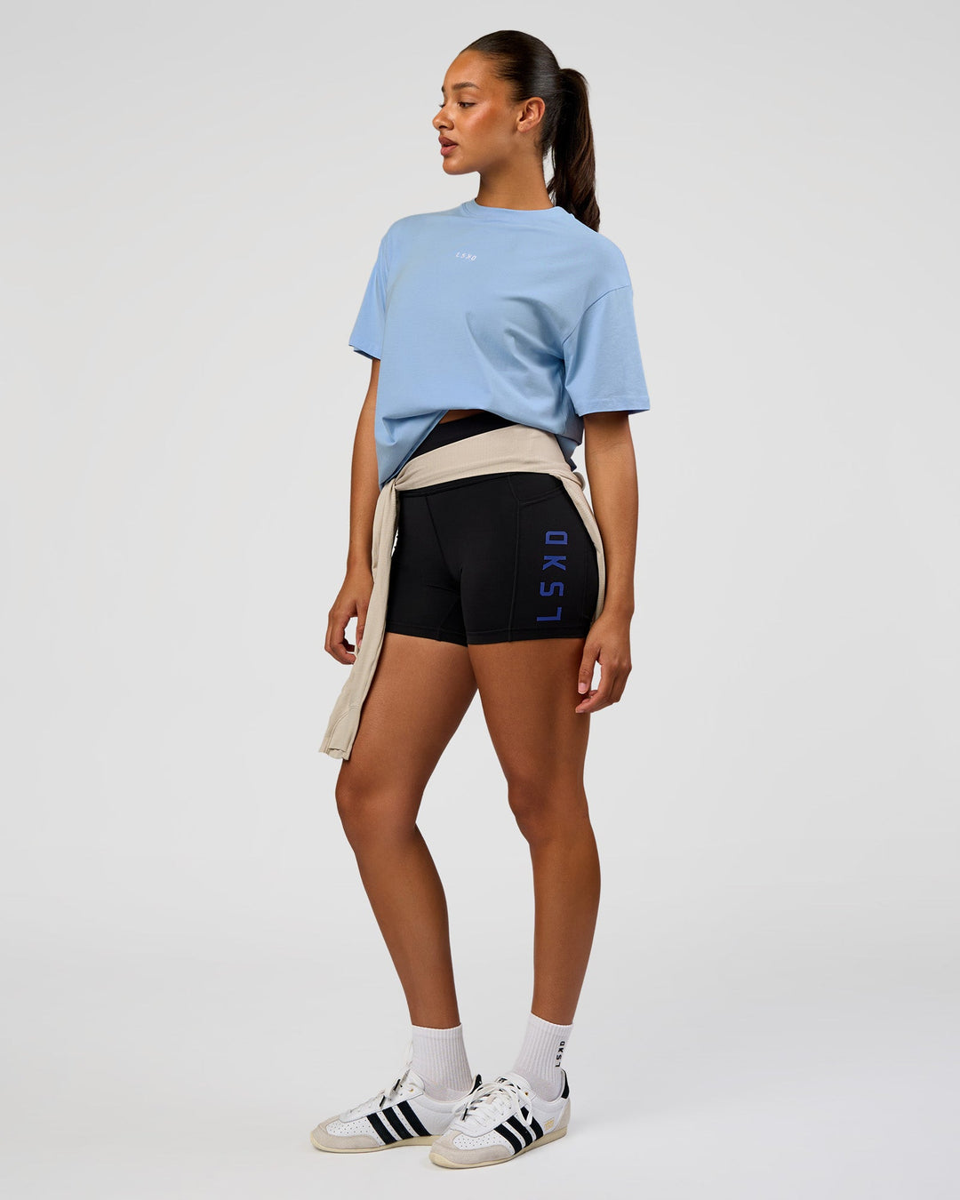 Woman wearing Go-To FLXCotton Oversized Tee - Open Air-White | Model:Rosie | Size:S