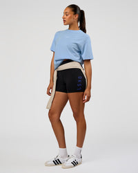 Woman wearing Go-To FLXCotton Oversized Tee - Open Air-White | Model:Rosie | Size:S