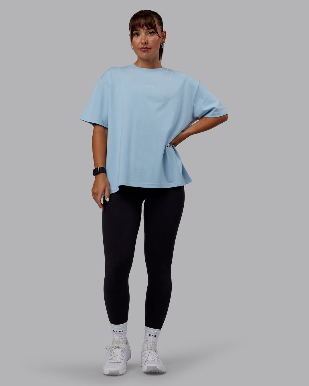 Woman wearing Go-To FLXCotton Oversized Tee - Glacial Blue-White